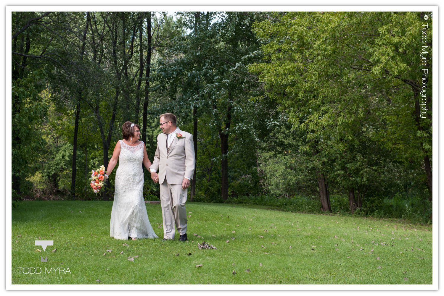 Philip-Cindy-St. Cloud-Wedding-Photography-Geyer-backyard-wedding-tent (14)