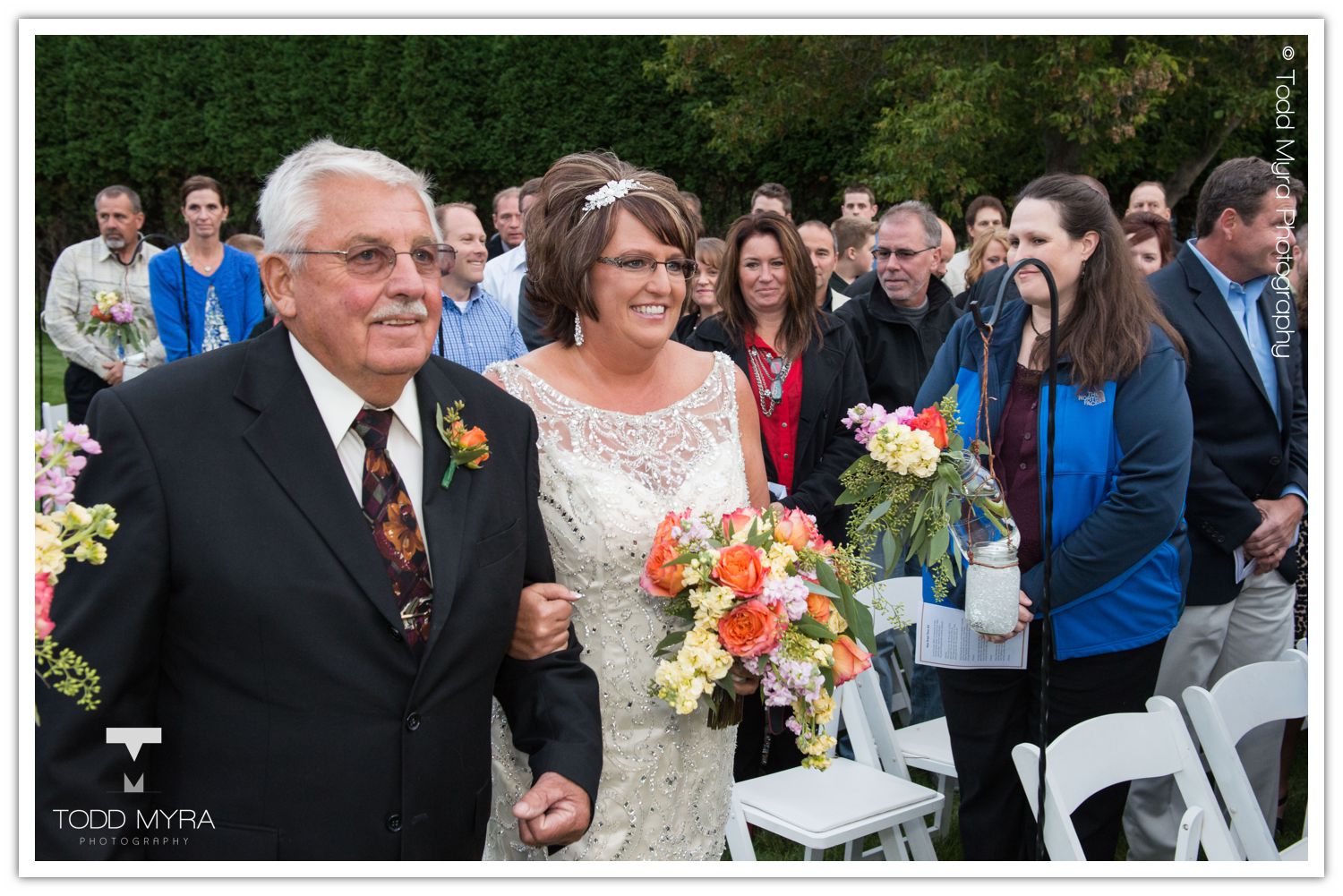 Philip-Cindy-St. Cloud-Wedding-Photography-Geyer-backyard-wedding-tent (22)