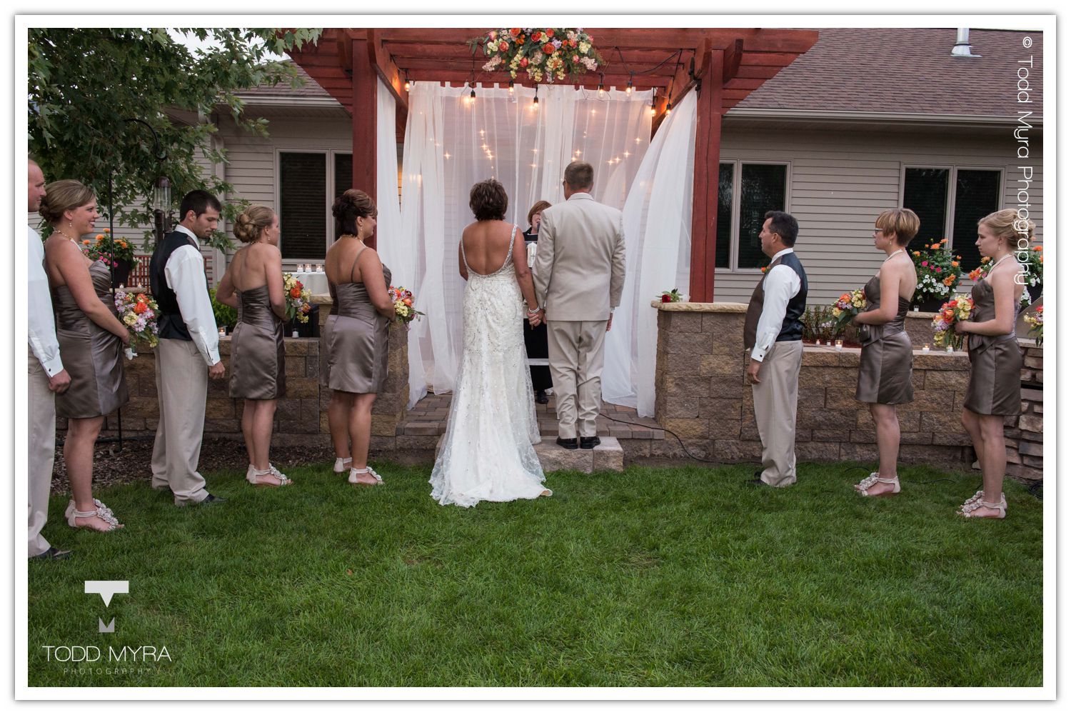 Philip-Cindy-St. Cloud-Wedding-Photography-Geyer-backyard-wedding-tent (23)