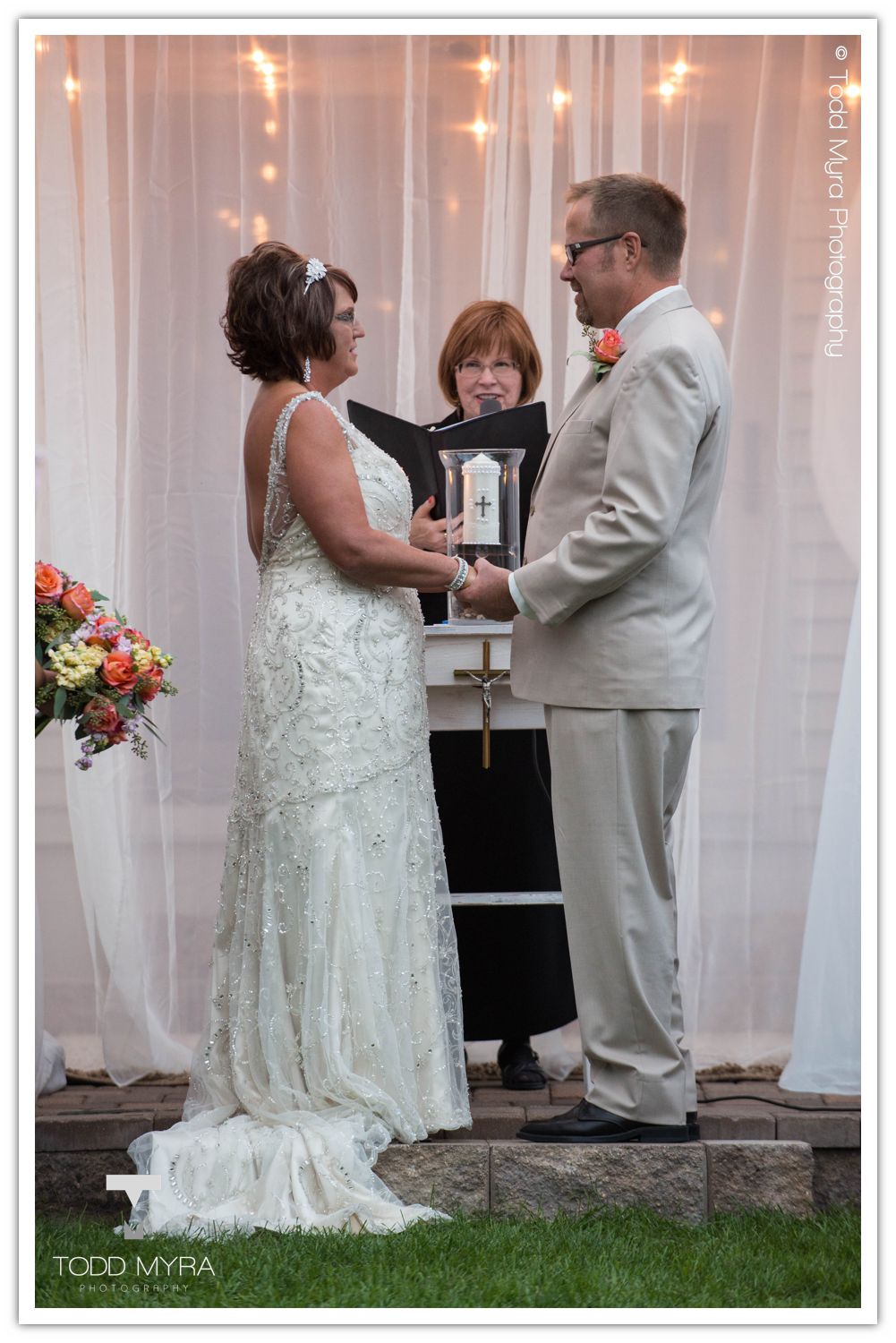 Philip-Cindy-St. Cloud-Wedding-Photography-Geyer-backyard-wedding-tent (26)