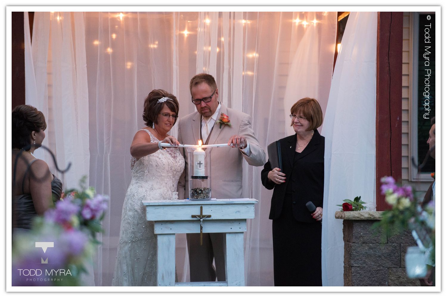 Philip-Cindy-St. Cloud-Wedding-Photography-Geyer-backyard-wedding-tent (27)