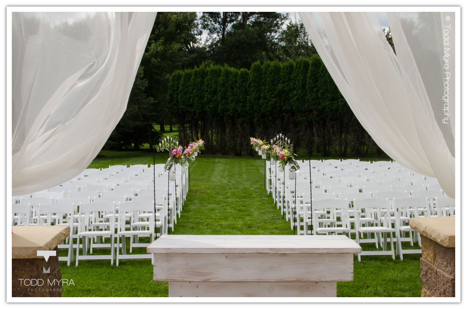 Philip-Cindy-St. Cloud-Wedding-Photography-Geyer-backyard-wedding-tent (3)