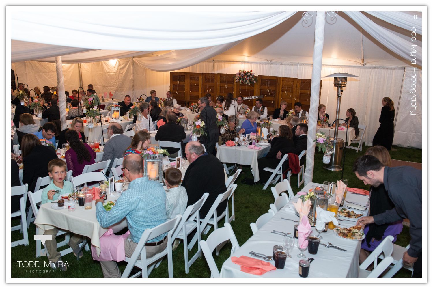 Philip-Cindy-St. Cloud-Wedding-Photography-Geyer-backyard-wedding-tent (30)