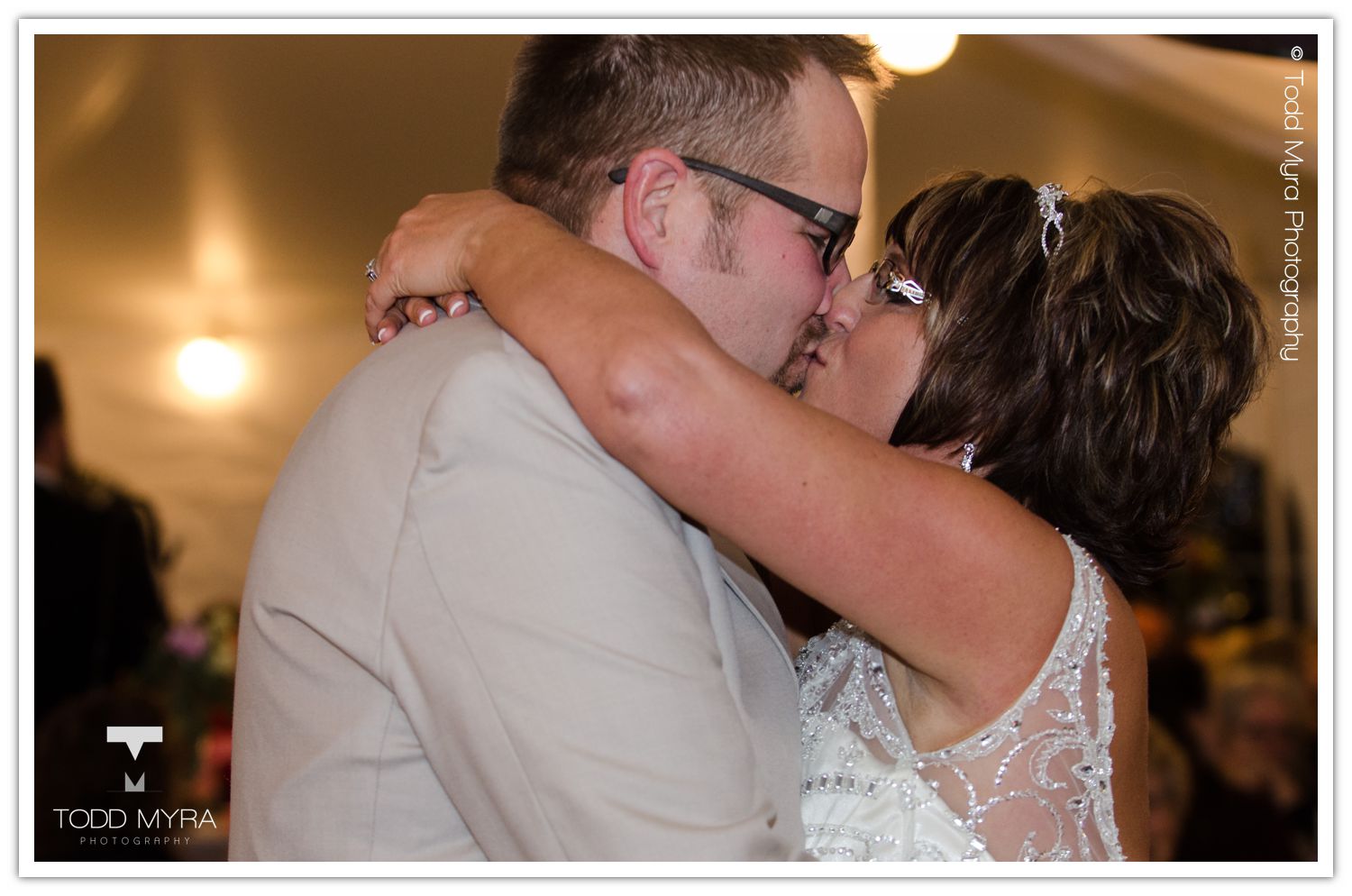 Philip-Cindy-St. Cloud-Wedding-Photography-Geyer-backyard-wedding-tent (31)