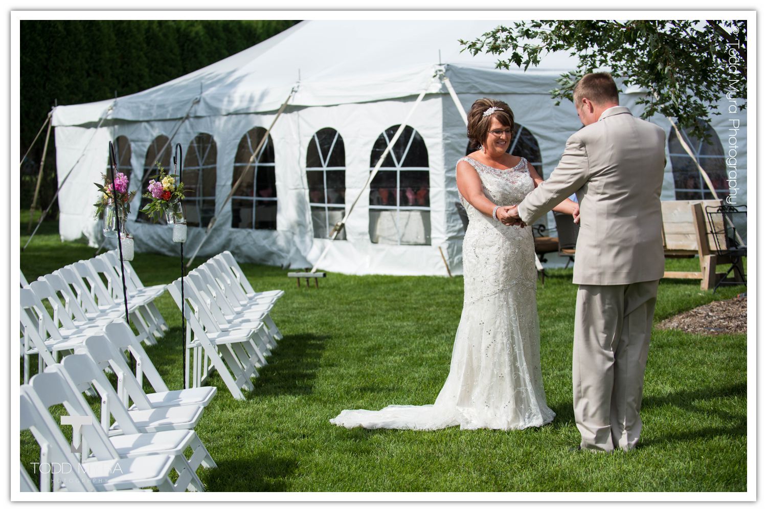 Philip-Cindy-St. Cloud-Wedding-Photography-Geyer-backyard-wedding-tent (4)