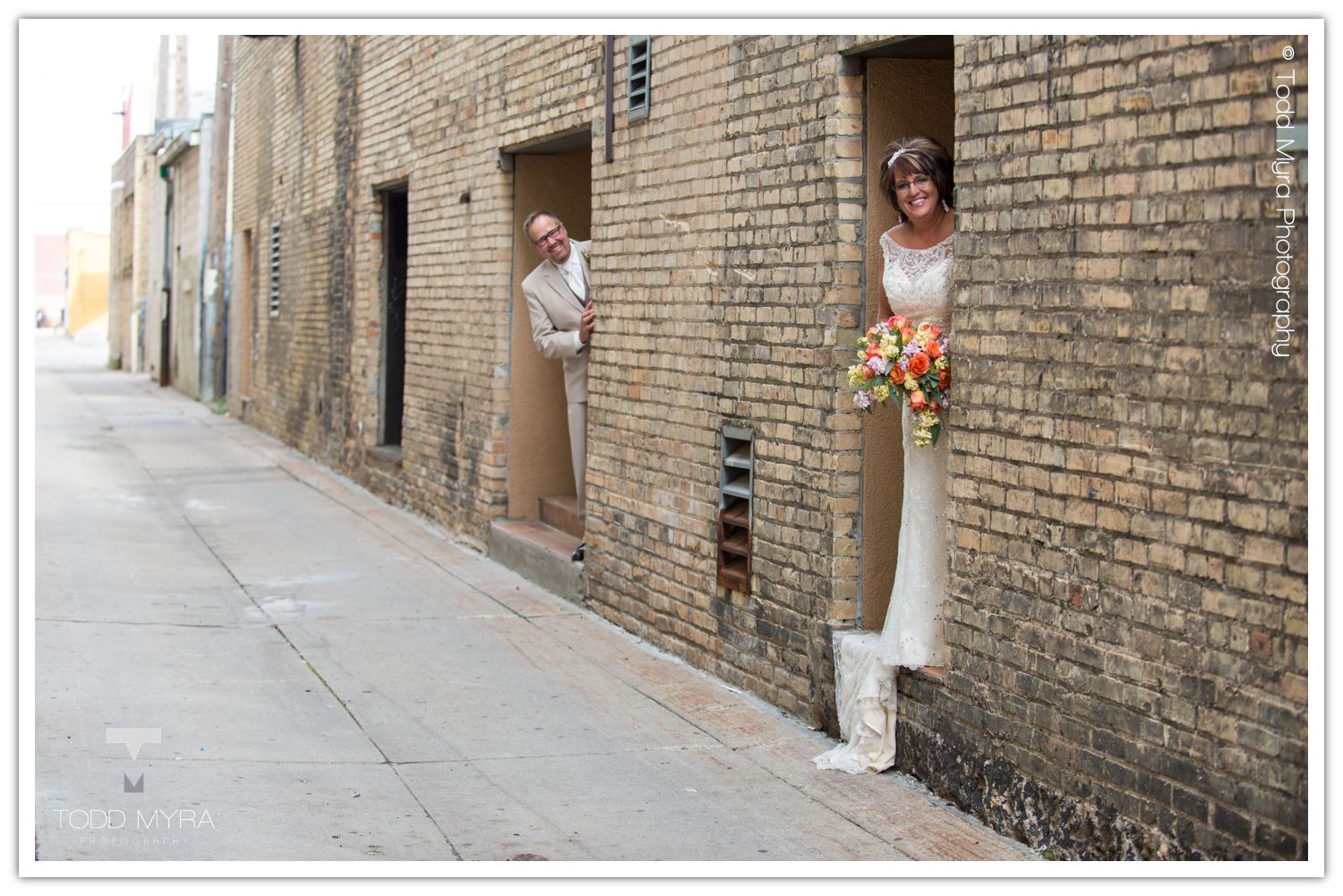 Philip-Cindy-St. Cloud-Wedding-Photography-Geyer-backyard-wedding-tent (6)