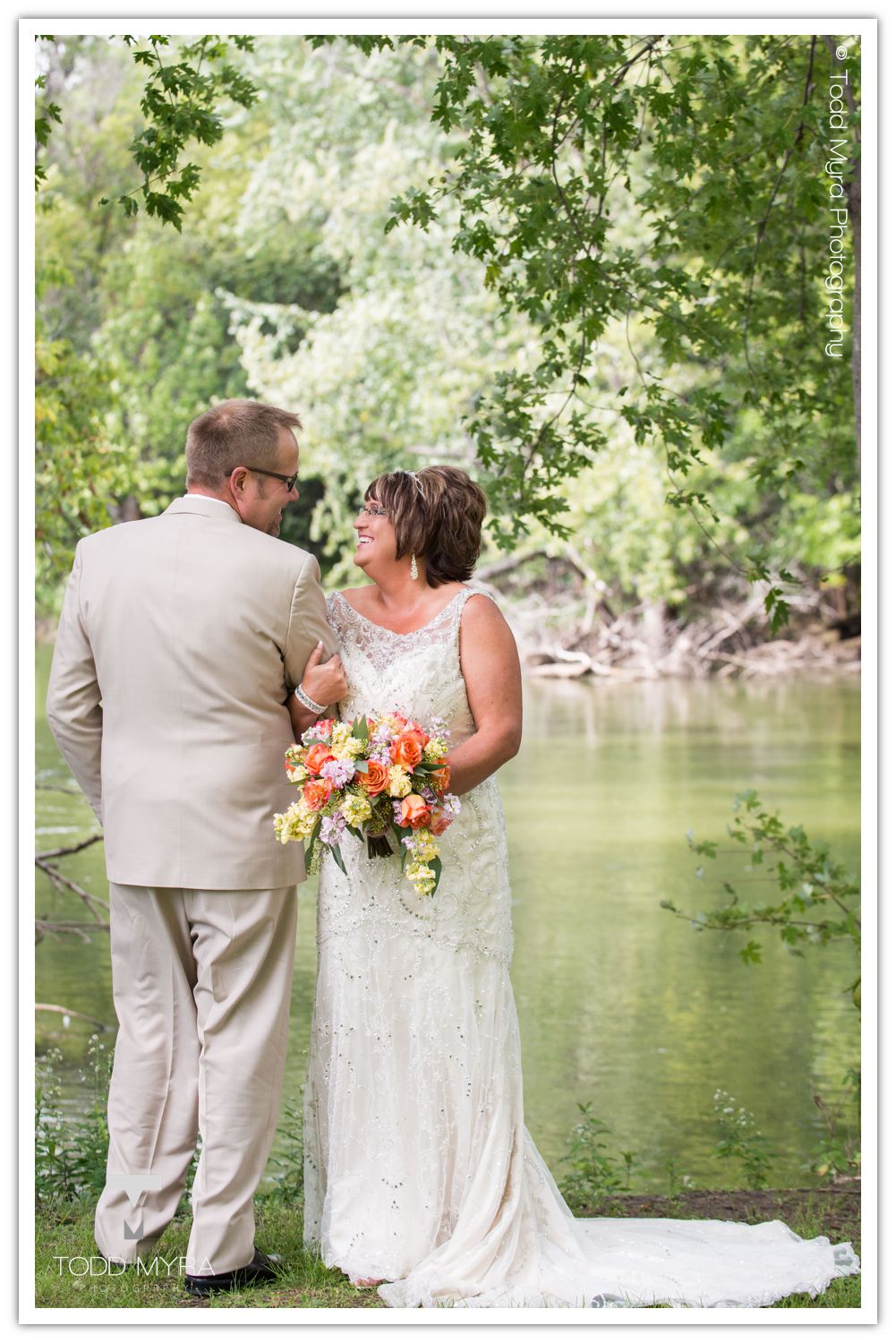 Philip-Cindy-St. Cloud-Wedding-Photography-Geyer-backyard-wedding-tent (9)