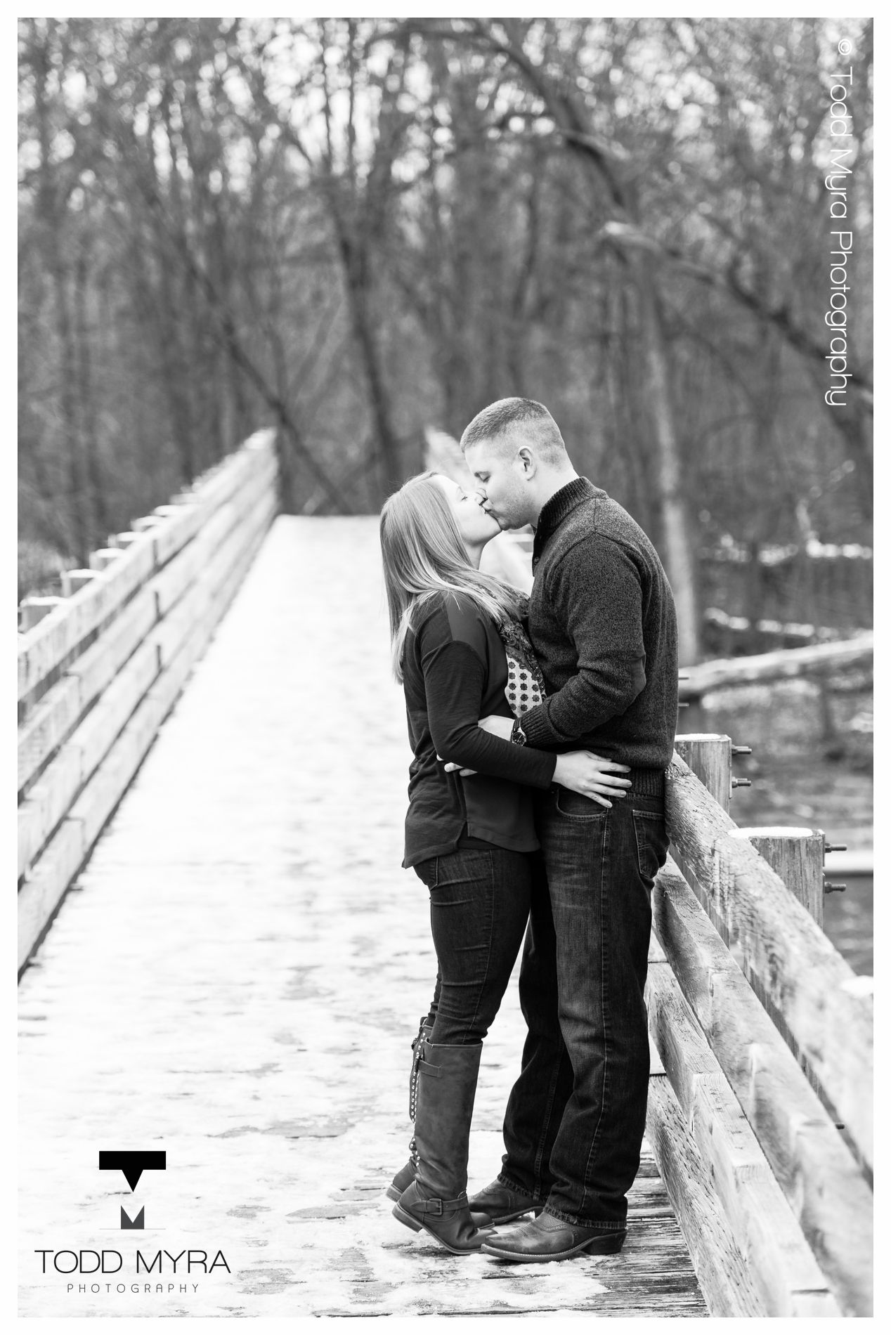 1 -St-Cloud-Wedding-Engagement-snow-river-football-mikki-shane