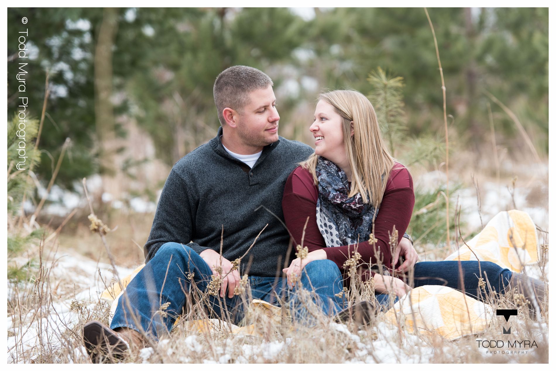 11 -St-Cloud-Wedding-Engagement-snow-river-football-mikki-shane