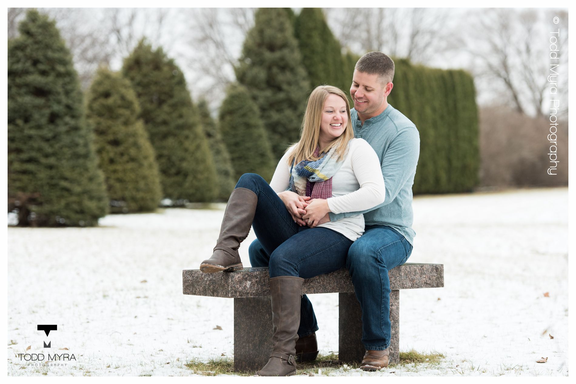 13 -St-Cloud-Wedding-Engagement-snow-river-football-mikki-shane