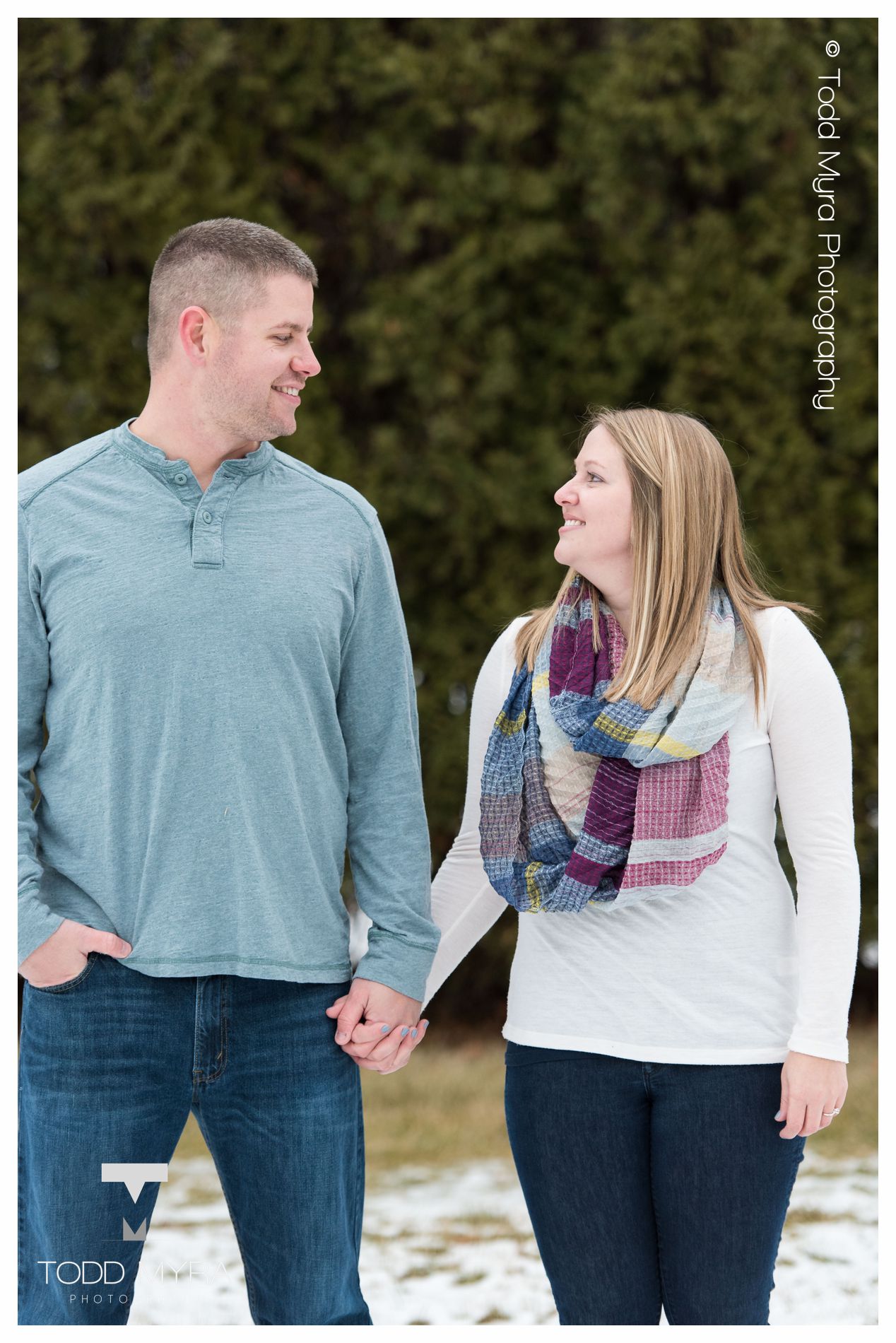 14 -St-Cloud-Wedding-Engagement-snow-river-football-mikki-shane