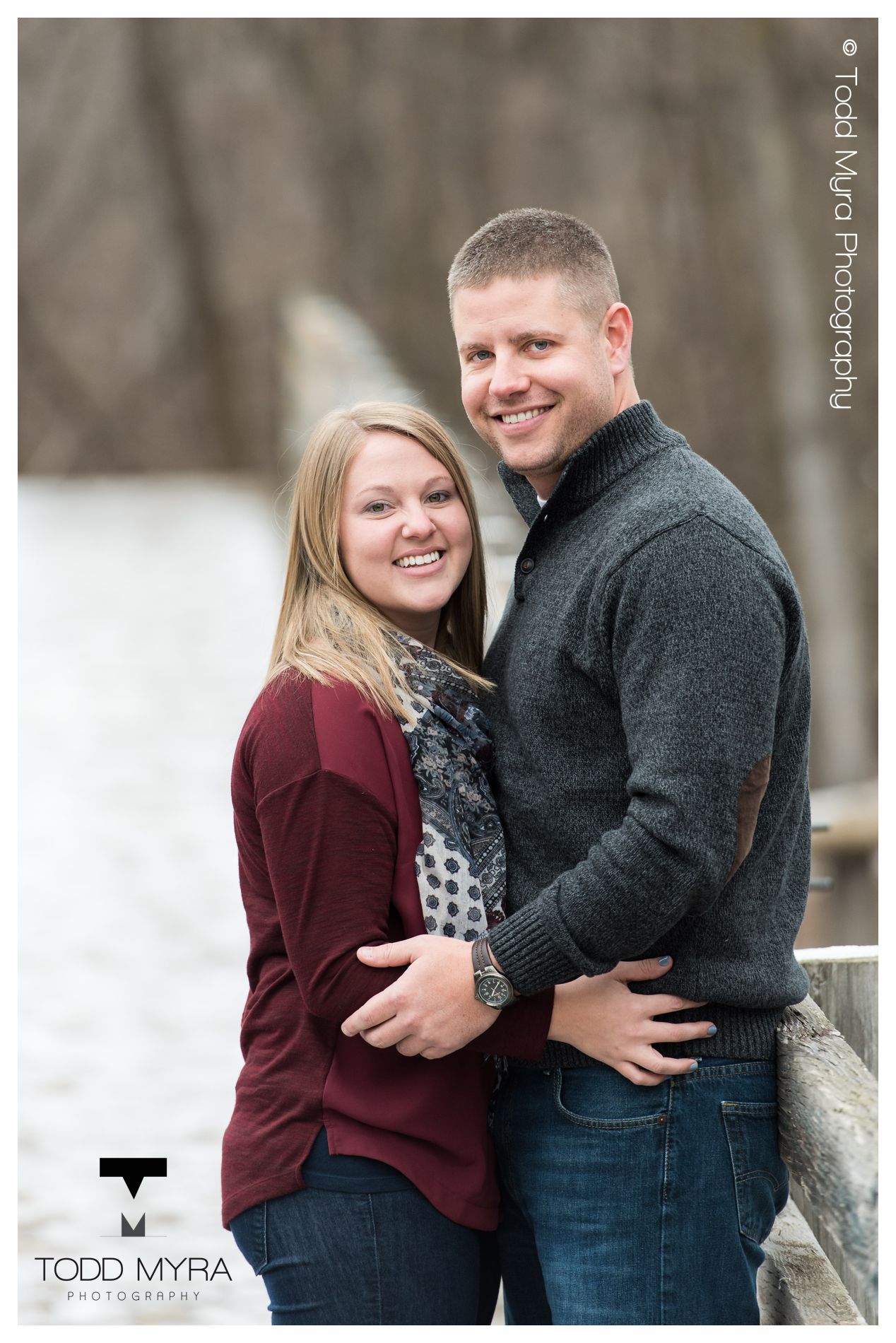 2 -St-Cloud-Wedding-Engagement-snow-river-football-mikki-shane
