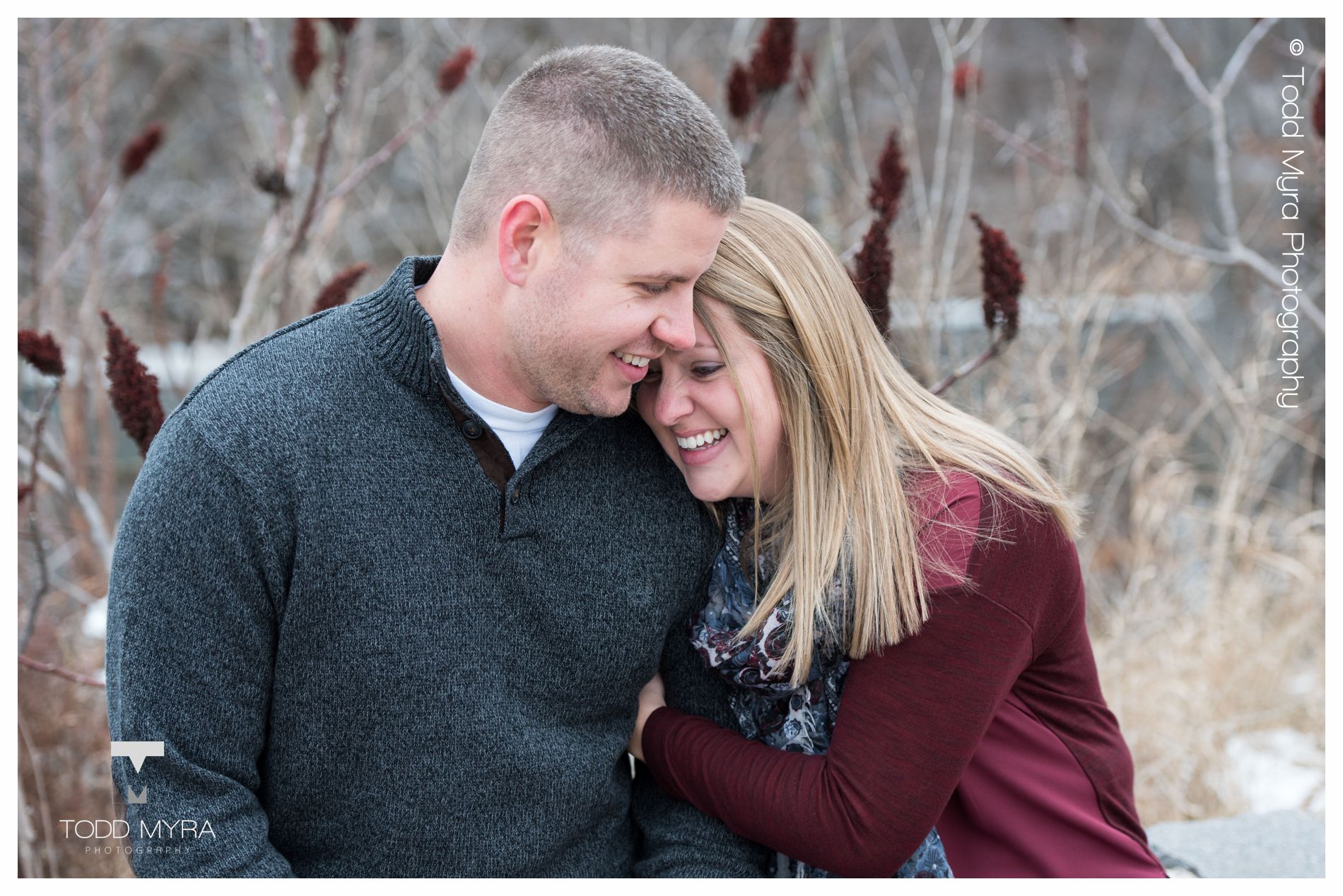 4 -St-Cloud-Wedding-Engagement-snow-river-football-mikki-shane