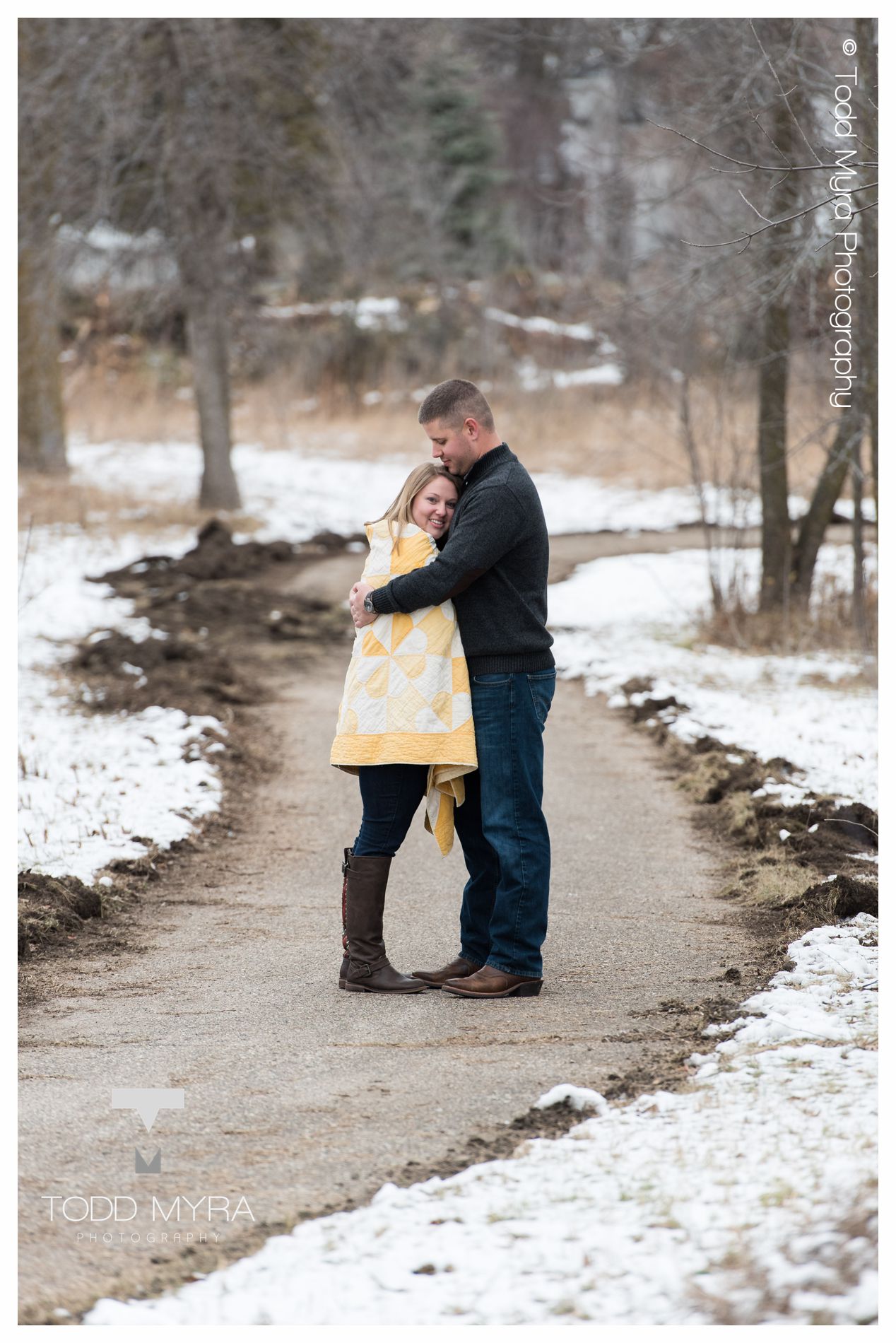 5 -St-Cloud-Wedding-Engagement-snow-river-football-mikki-shane