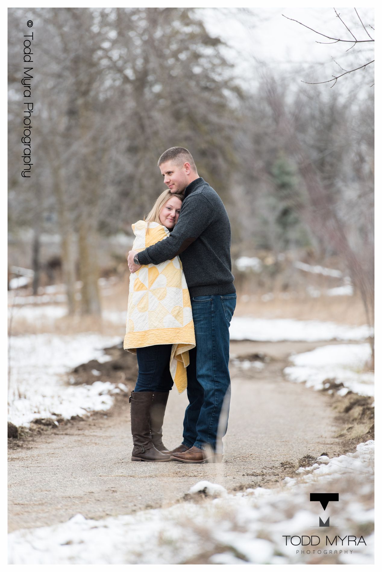 6 -St-Cloud-Wedding-Engagement-snow-river-football-mikki-shane