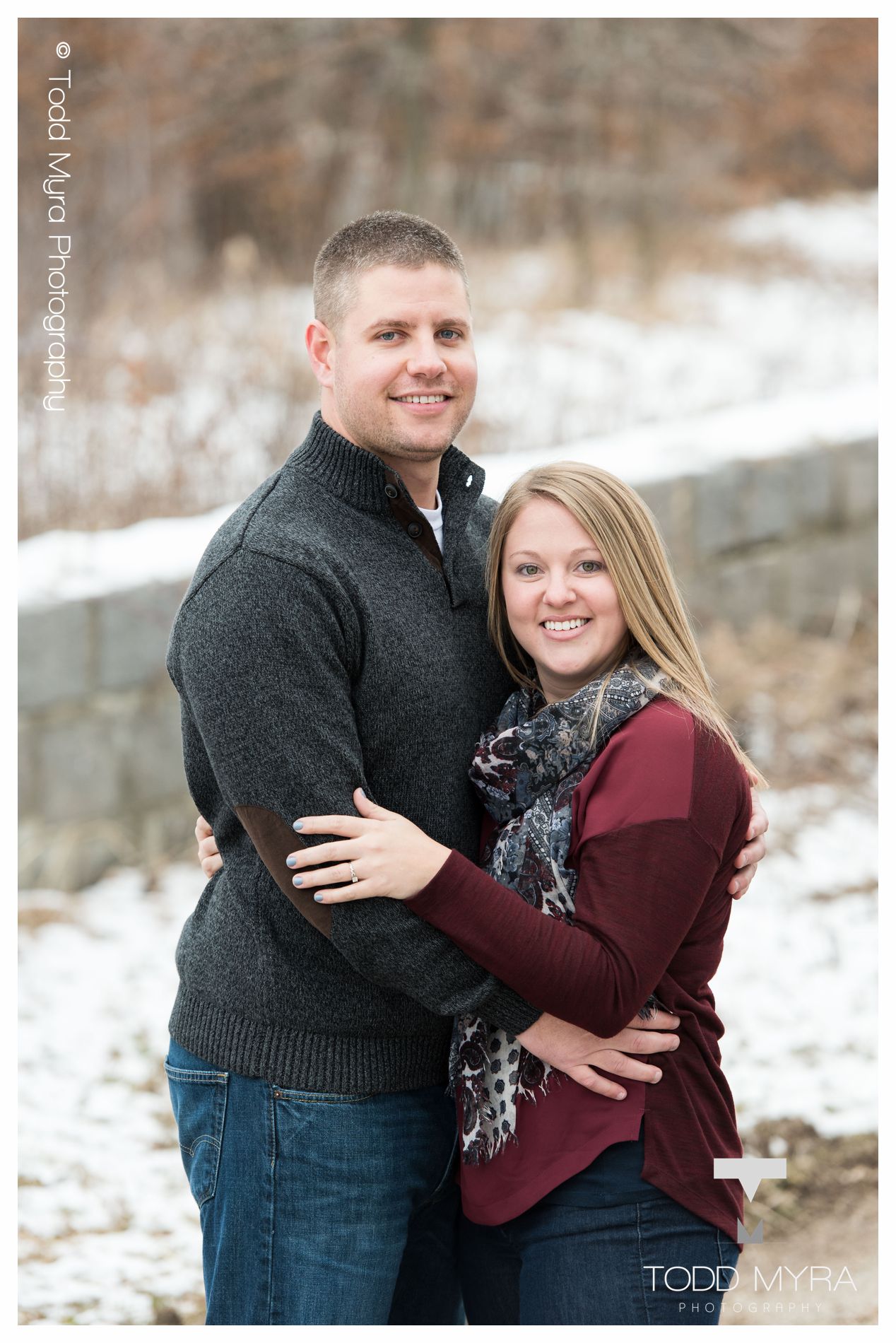 7 -St-Cloud-Wedding-Engagement-snow-river-football-mikki-shane