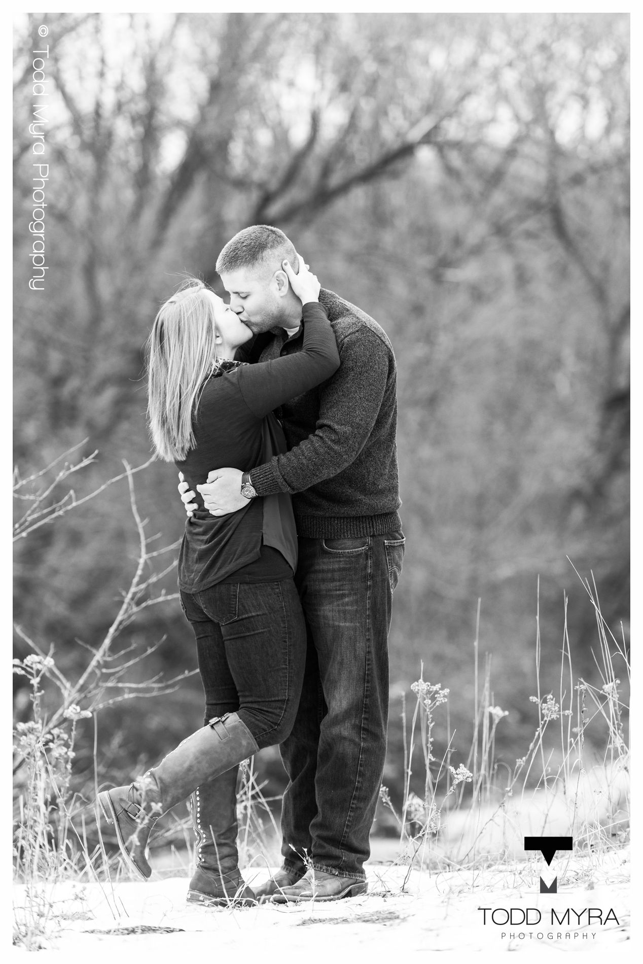 9 -St-Cloud-Wedding-Engagement-snow-river-football-mikki-shane