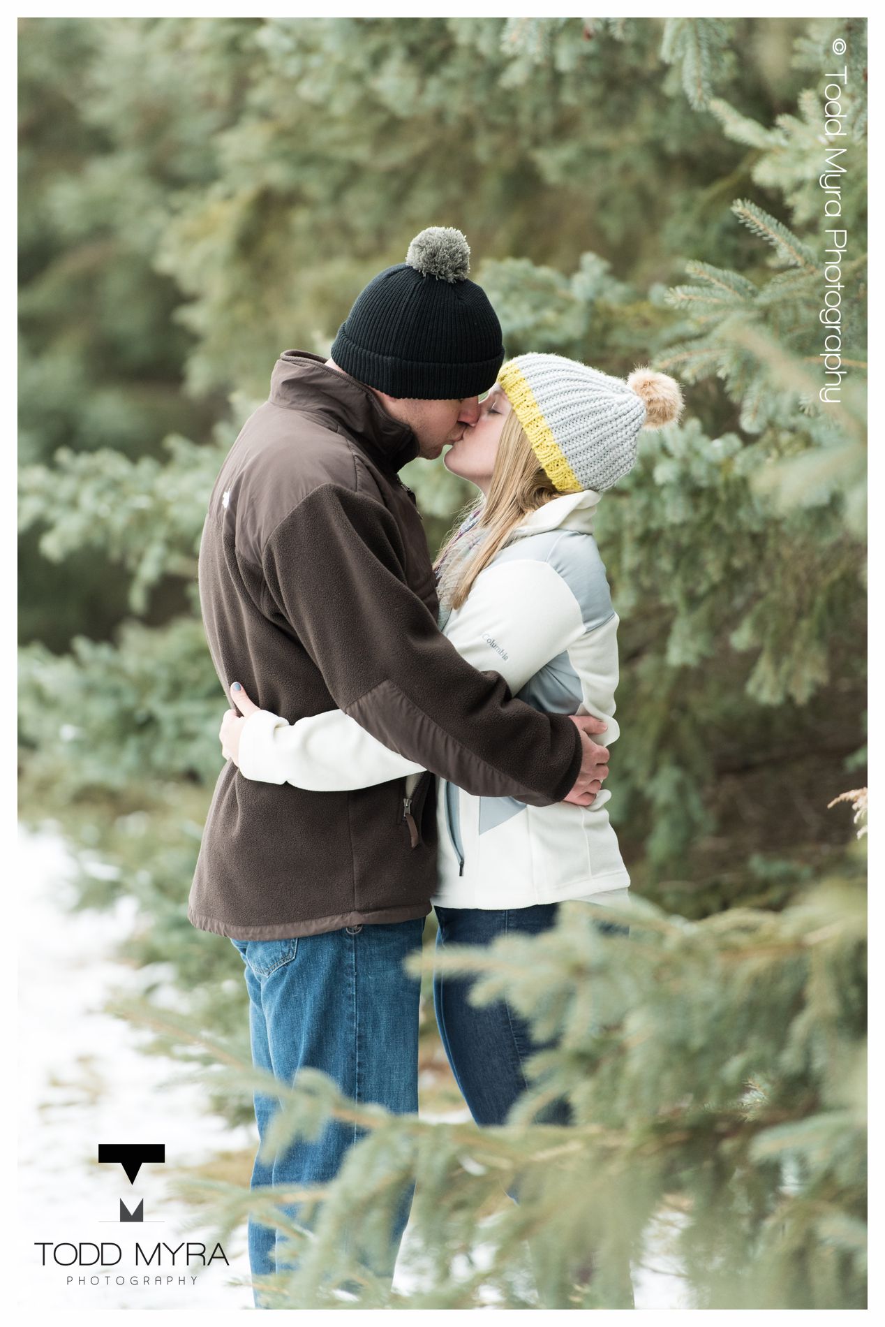 16 -St-Cloud-Wedding-Engagement-snow-river-football-mikki-shane